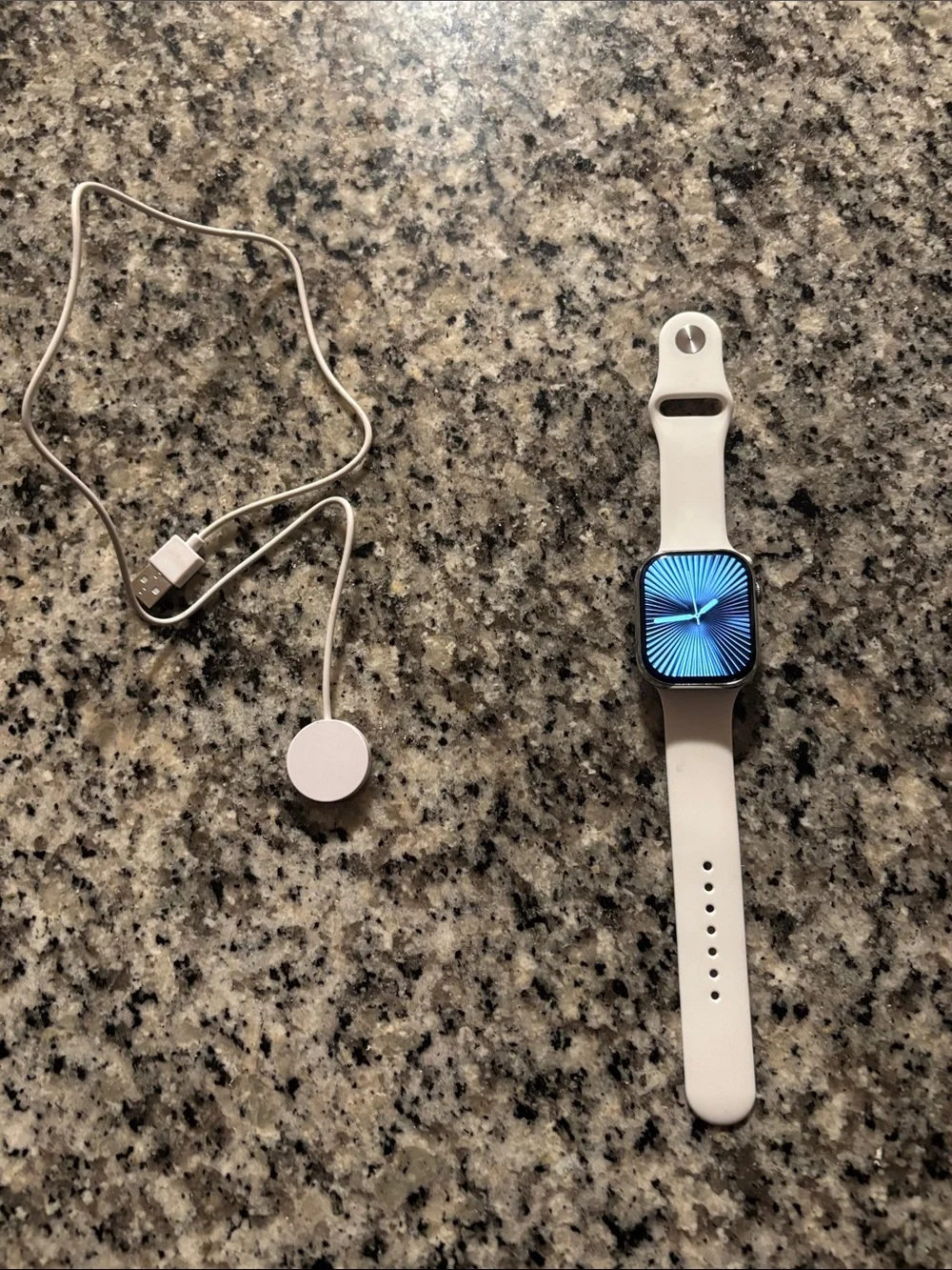 Apple White Smartwatch with White Silicone Sport Band and Charger